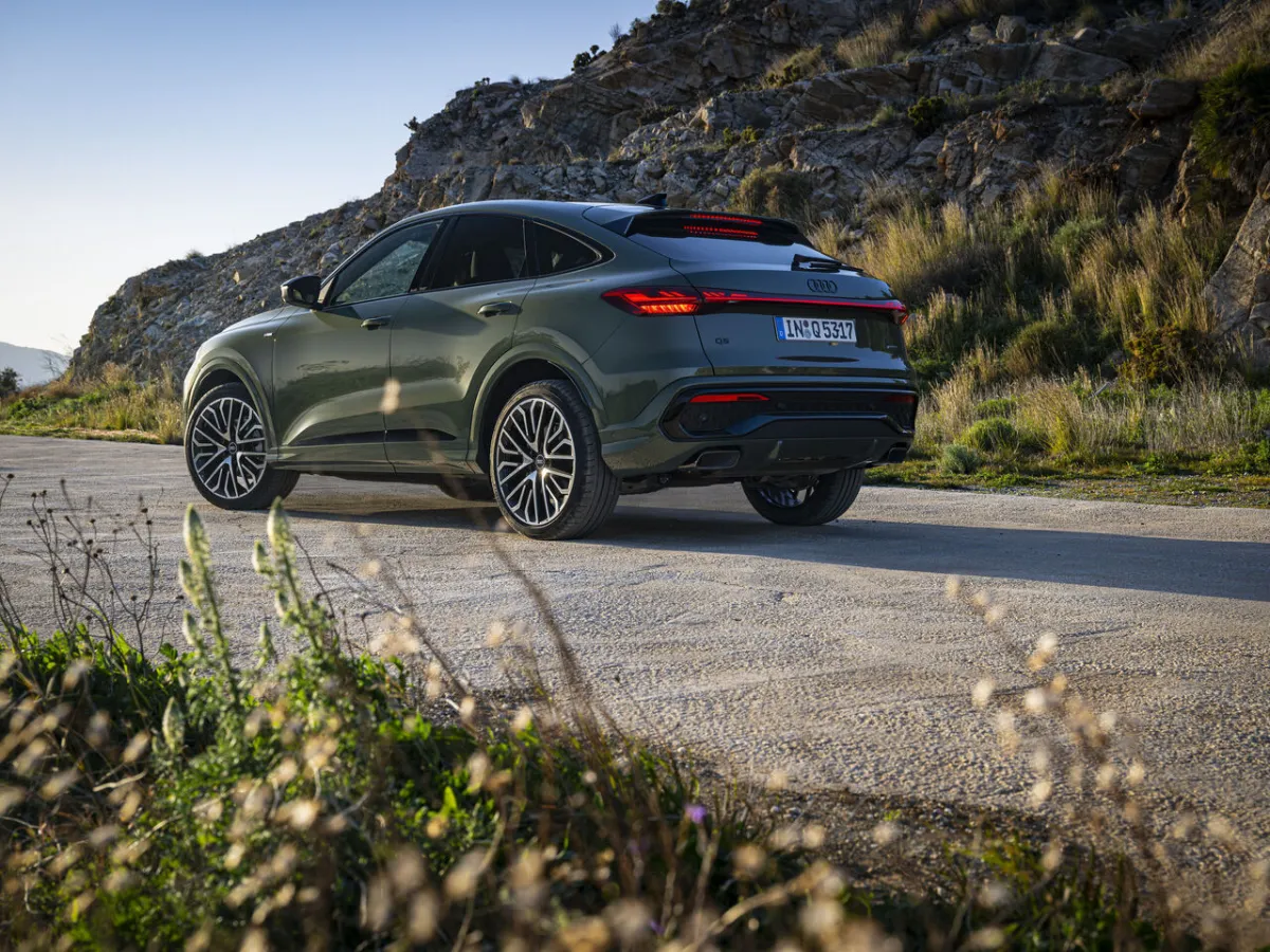 Audi Q5 Sportback rear three-quarter view, on a mountain road
