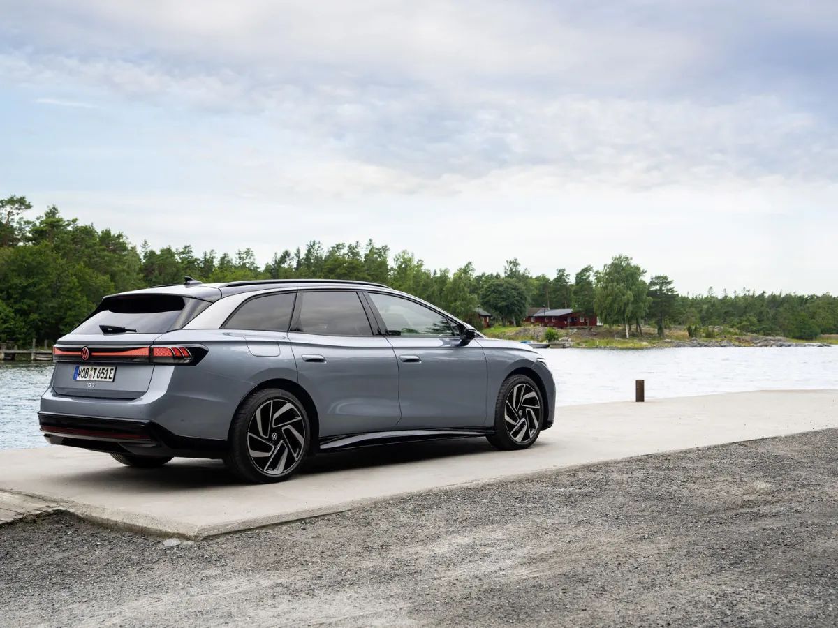 Volkswagen ID.7 Tourer from the rear, by a lake